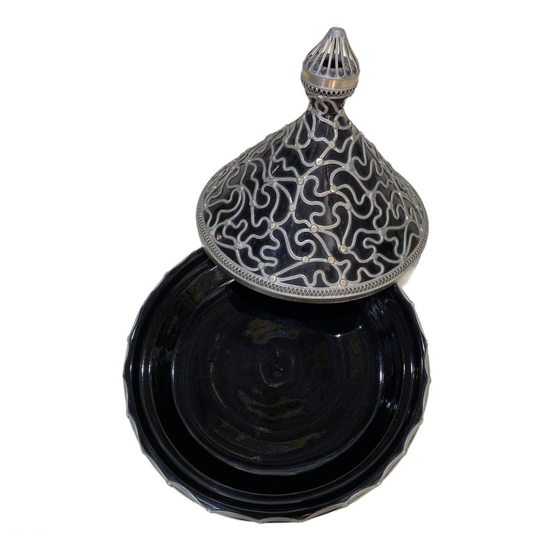 A handmade and hand-painted Moroccan tagine dish