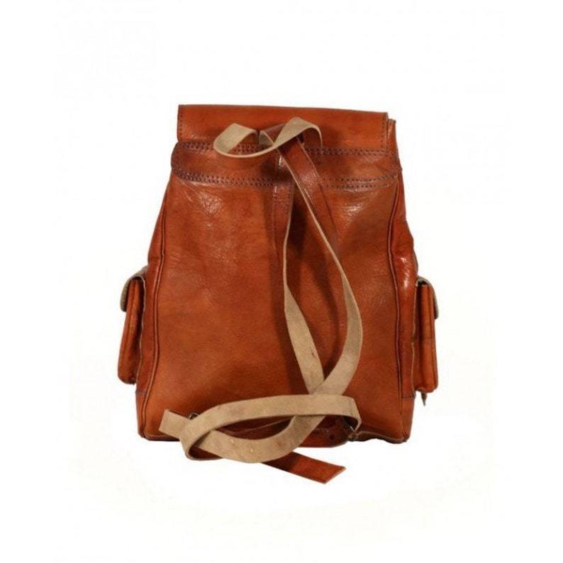Genuine Backpack in leather and high-end kilim.