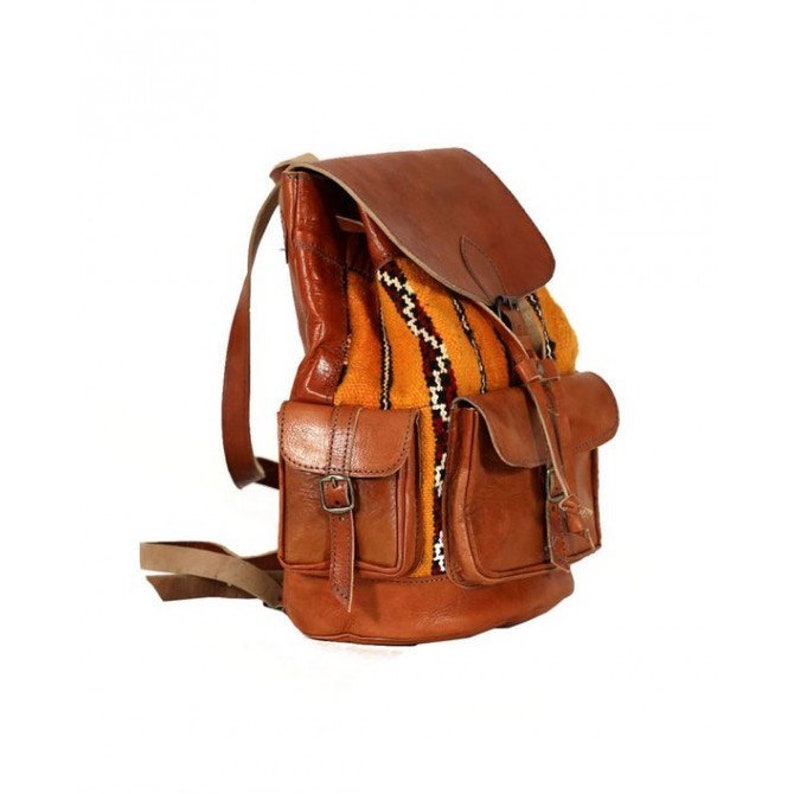 Genuine Backpack in leather and high-end kilim.
