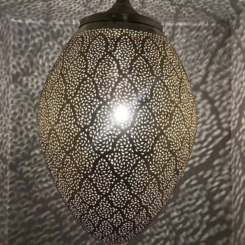 Brass vintage lamp with arabic pattern